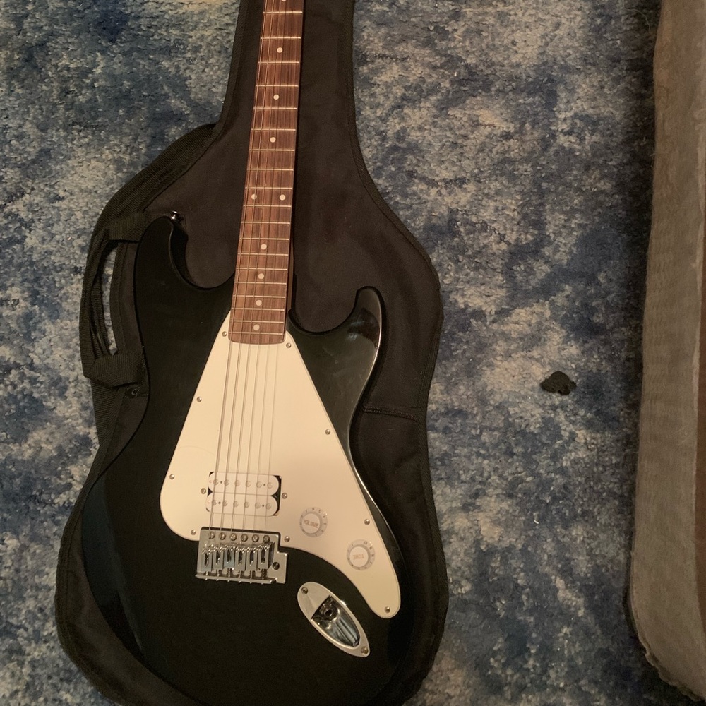 Black and white first act guitar